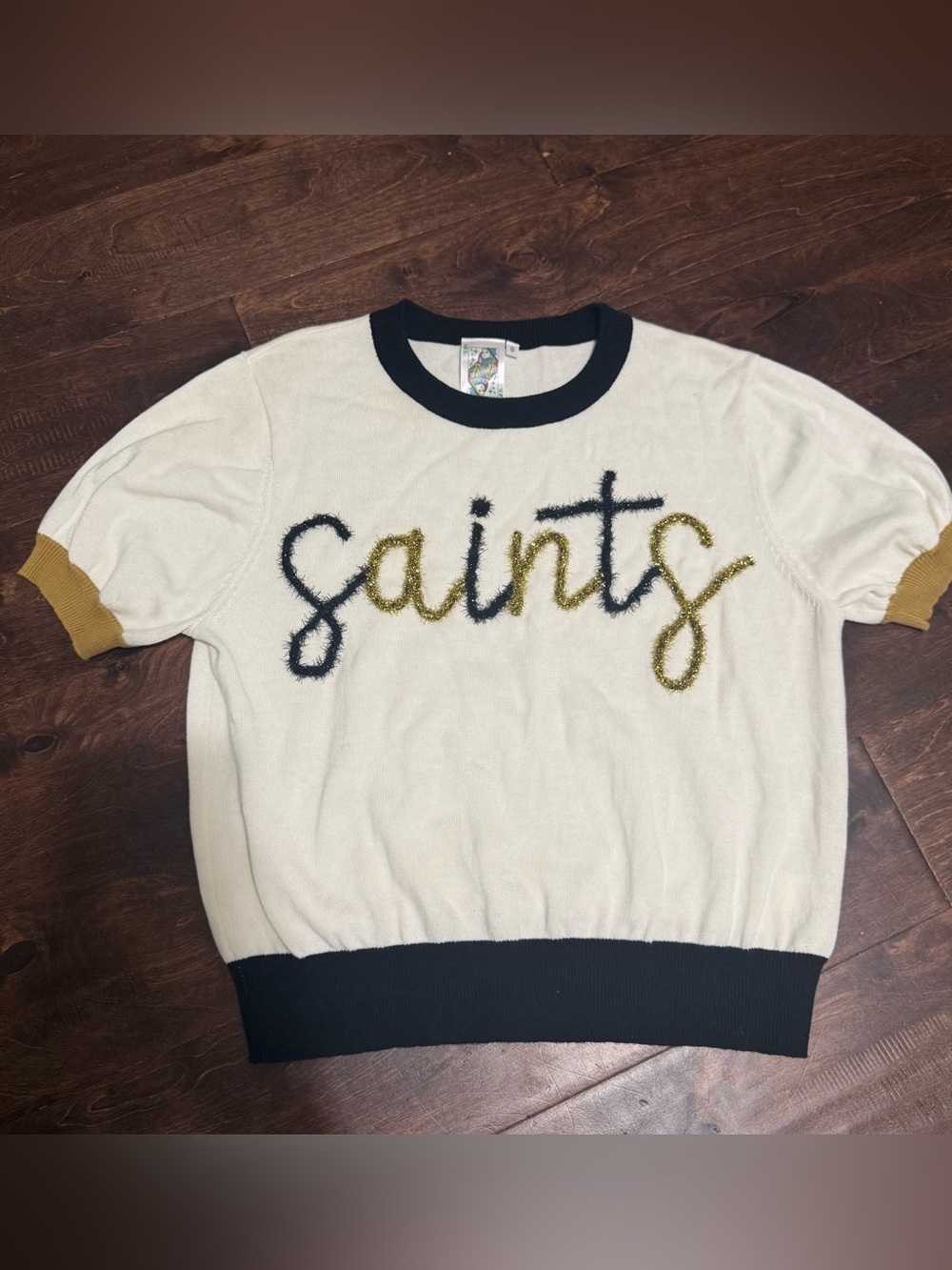 QUEEN OF SPARKLES White Knit Crop Top with Black and Gold Trim